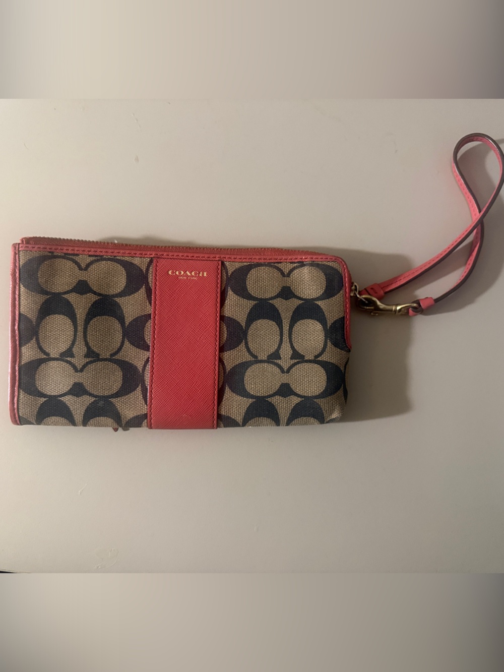 Coach Signature Canvas Wristlet in pink and Tan